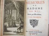 an old book with a picture of a man in a room