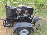 an image of a tractor with a trailer attached to it