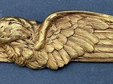 an image of a close up of a metal object with a bird on it