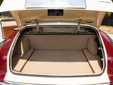 a trunk of a red and white car with its trunk open