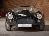 an image of a black sports car parked in a garage