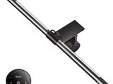 an image of a black and silver pole with a remote control