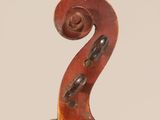 an old violin with a wooden back and a long neck