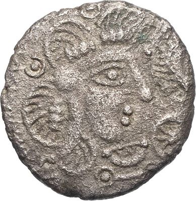 une pièce d'argent sur laquelle figure un motif