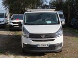 a white van that is parked in a parking lot