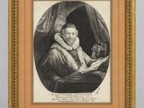 a portrait of an old man reading a book in a gold frame