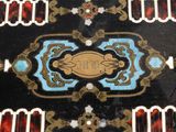a close up of a table with a design on it