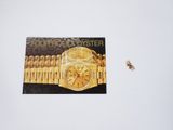 a picture of a gold watch and a gold bracelet