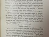 an open book with a black and white image of a clock on it