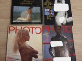 three vintage photo magazine covers on a table with a woman in a bikini