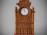 a wooden clock that is sitting on a table