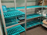 a room with shelves and shelves filled with boxes
