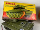 a toy tank that is sitting on top of a box