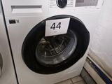 a washing machine with a number on the front of it