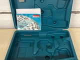 a close up of a blue tool case on a table