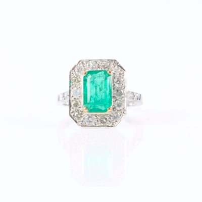 an emerald and diamond ring