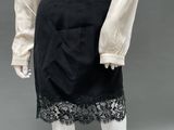 a white shirt and black skirt on a mannequin mannequin mannequin mannequin mannequin mannequin mannequin mannequin