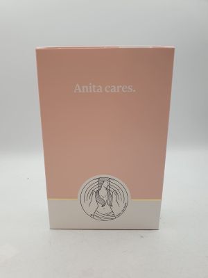une boîte rose sur laquelle figure le visage d'une femme