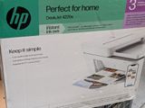 a box with a printer on it sitting on a table