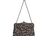 a black purse with pink and white beads hanging from a chain