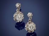 a pair of diamond earrings