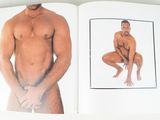 a book with a picture of a shirtless man on it