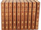 un ensemble de sept livres ornés de lettres dorées