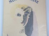 the front cover of a book with an image of a woman ' s face