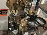 a glass table with a lot of different items on it