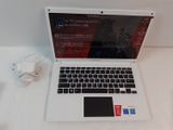 a laptop computer sitting on a table with a mouse