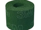a roll of green cloth with writing on it