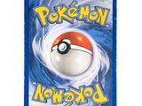 a close up of a pokemon card on a white surface