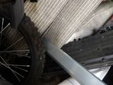 a close up of a radiator and a motor bike