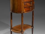 a small table with a marble top and wooden legs
