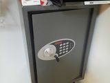 a safe box that is sitting on top of a cardboard box