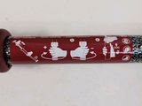 a close up of a pen with a santa clause design on it