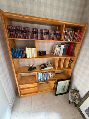 a bookshelf with a lot of books on it
