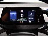 the dashboard of a car with a digital display on it