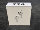 a box with two airpods in it on a table