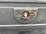 a close up of a suitcase with a key in it