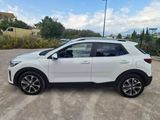 a white suv parked in a parking lot