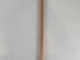 a pencil and a piece of paper on a white surface