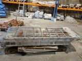 a large pile of wood sitting on a pallet in a warehouse