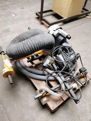 a pile of hoses and a blower on a pallet