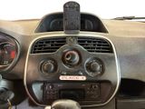 a car dashboard with a phone holder on top of it