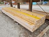 several pieces of wood are stacked on top of each other in a pile