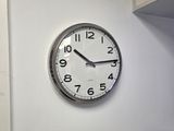a clock that is on the wall in the room