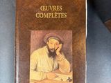 a book with a picture of a man sitting at a table