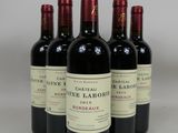 six bottles of red wine are lined up in a row