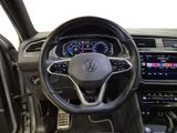 the interior of a car with a steering wheel and dashboard controls